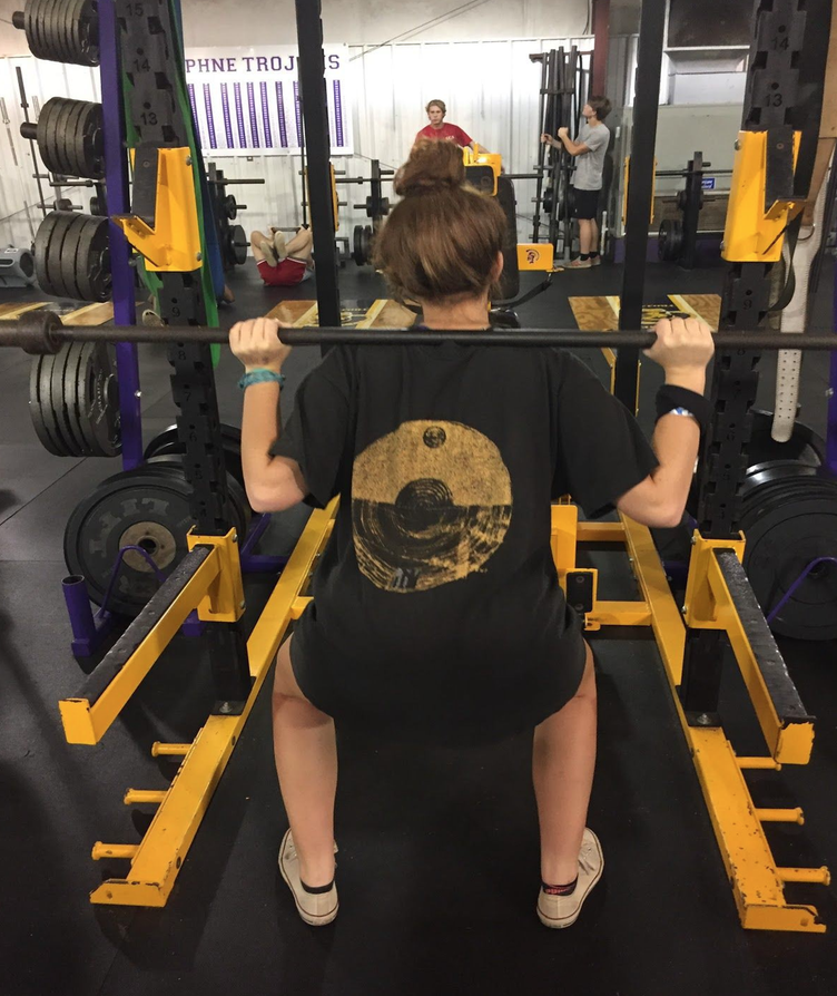 Liz Burt works on strengthening exercises in the weight room.