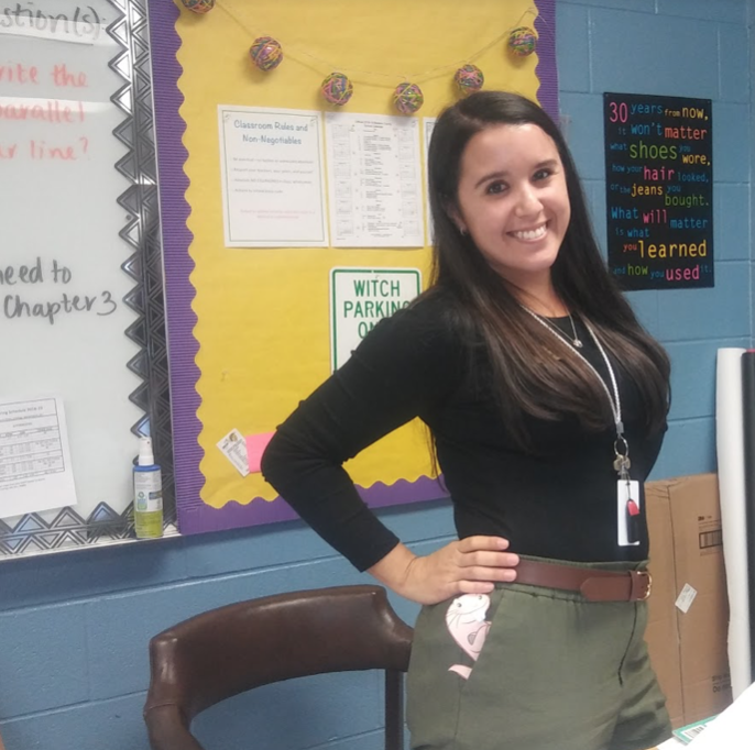 For Halloween, Ms. Ludvigsen dressed as Kim Possible, complete with a naked mole rat peeking out of her pocket.