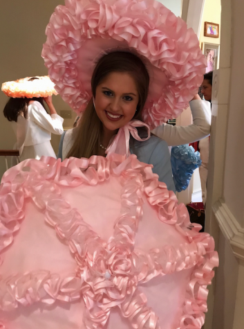 Lizzie King tries on her color for the Dogwood Trail Maids at the dress fitting.