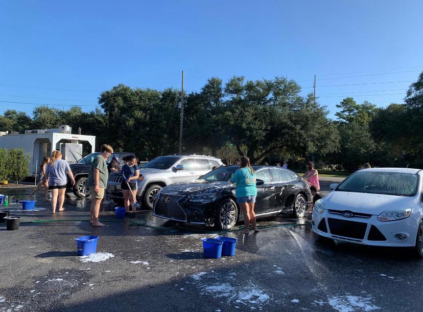 At one point, there were 4 cars being washed
